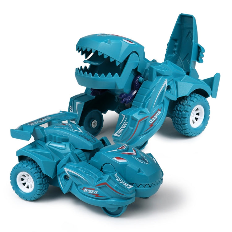 Teal dinosaur-themed deforming toy car with jagged teeth and white-spoked wheels
