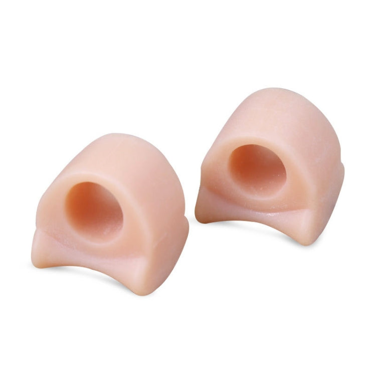 Soft nude skin-tone toe separator covers, two-piece pair with rounded openings for toes.