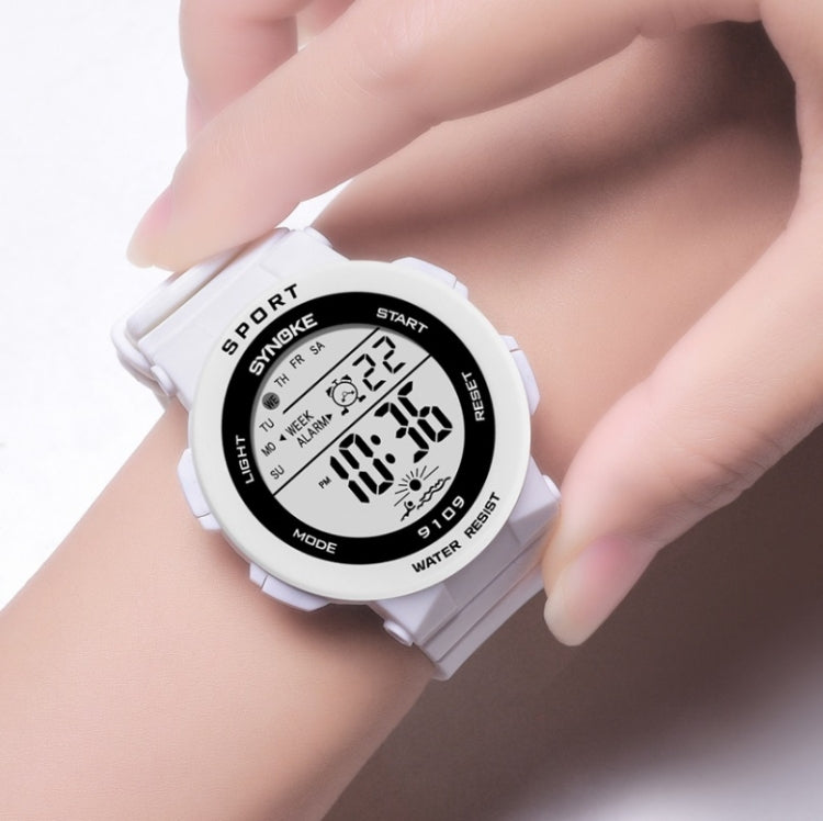 SYNOKE white digital sport watch on wrist with water-resistant LCD display