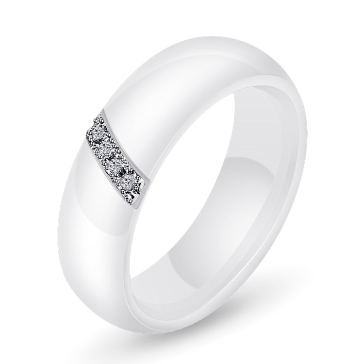 White ceramic zircon ring with sparkling crystal inlay on the band