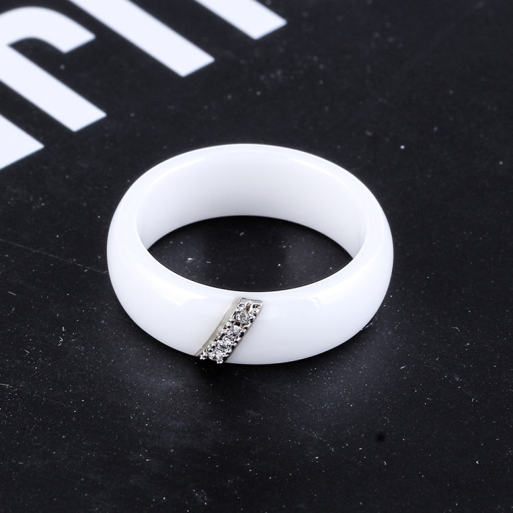 White ceramic ring with rectangular zircon crystal inlay on top