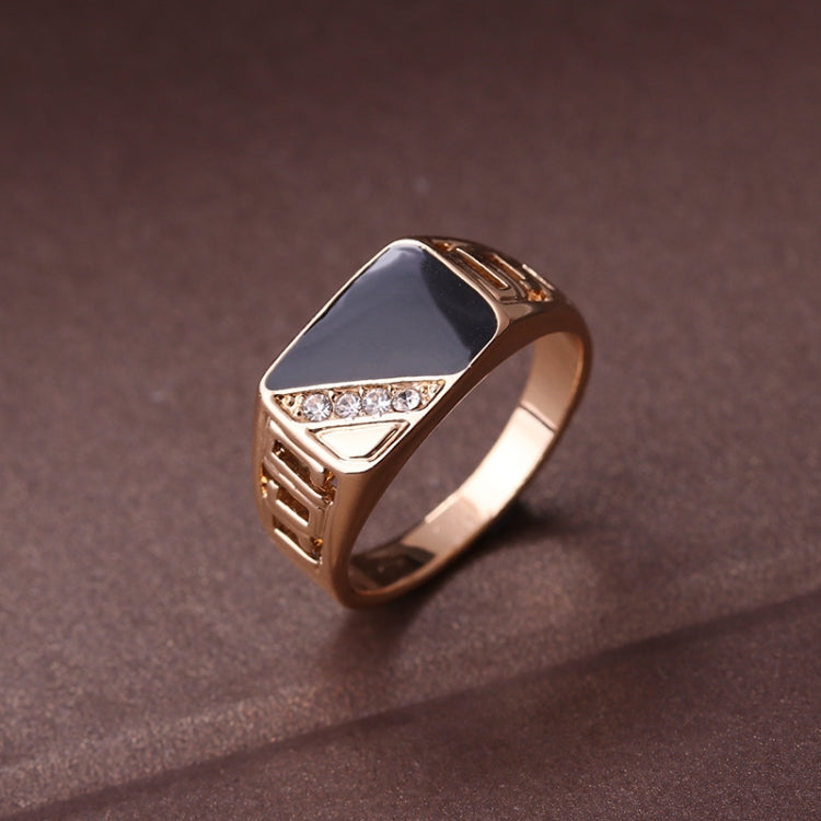 Gold-tone men's enamel ring with black center and rhinestone trim, geometric band