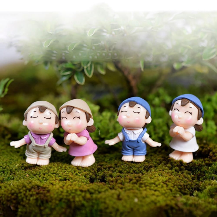 Set of 4 mini cartoon house figurines in purple, pink, blue, and white with hats