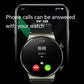Round smartwatch with silver case and black strap, dark call screen with red and green icons