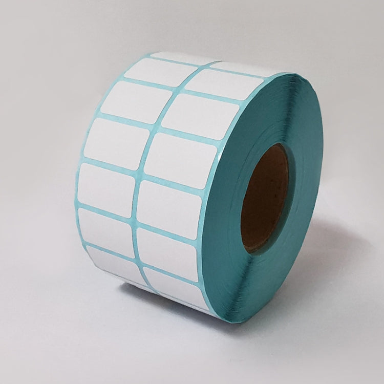 Thermal barcode label roll close-up with teal grid labels and white face stock