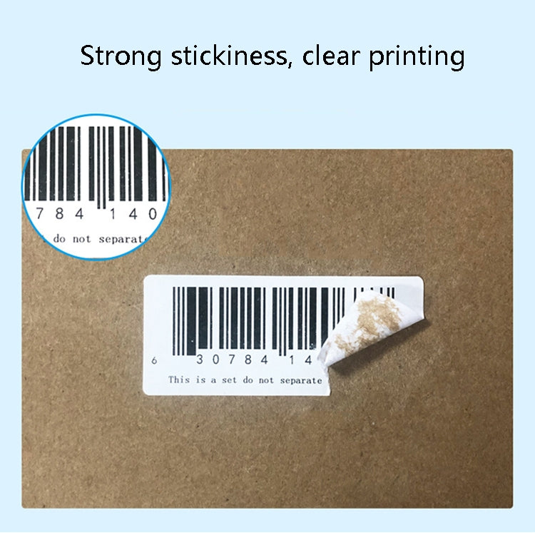 Barcode thermal label partially peeled from backing on brown test board