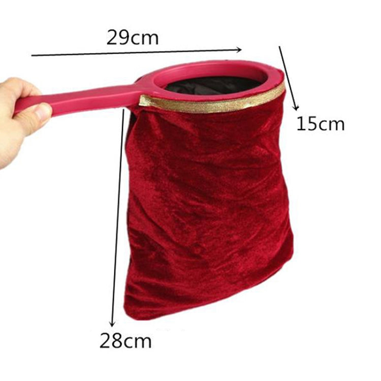 Red velvet change bag prop; measures 29cm wide x 28cm long x 15cm tall.