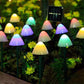 Outdoor solar mushroom string lights with multicolor glow on garden stakes