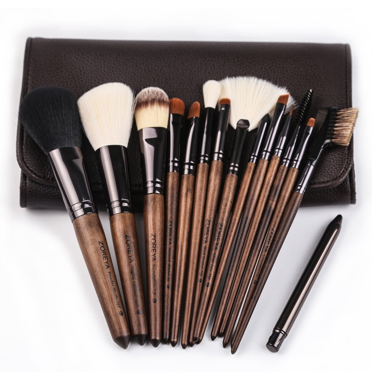 Fifteen makeup brushes in a brown leather-look case with silver ferrules