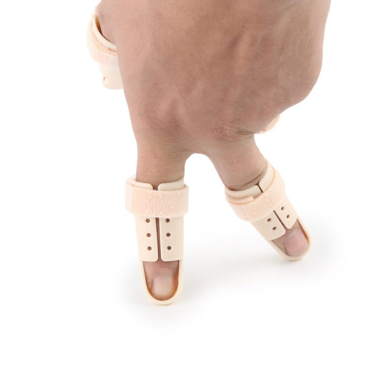 Adjustable finger splints, beige padded brace with perforations and straps on hand