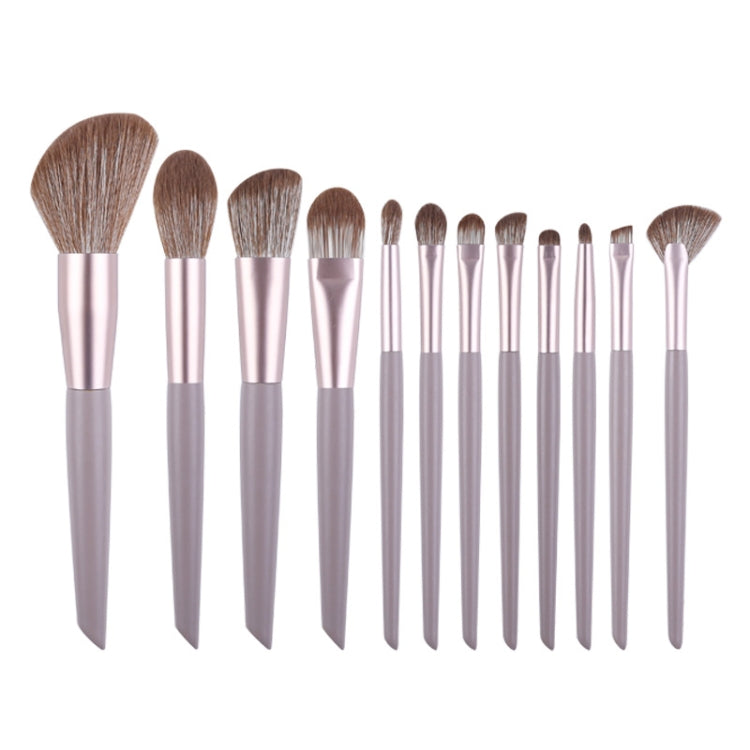 Makeup brush set with lilac handles and brown bristles, 12-piece lineup