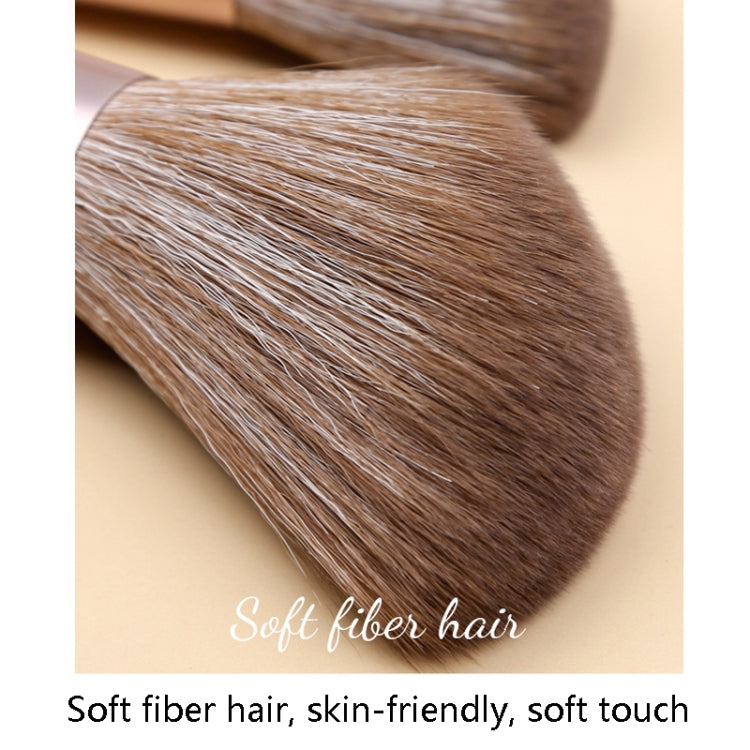 Close-up of brown synthetic bristles on a lilac makeup brush head