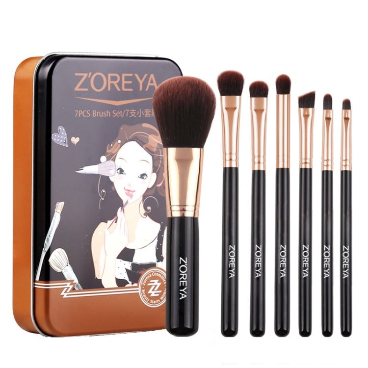 Black makeup brush set with metal case, gold ferrules and brown bristles