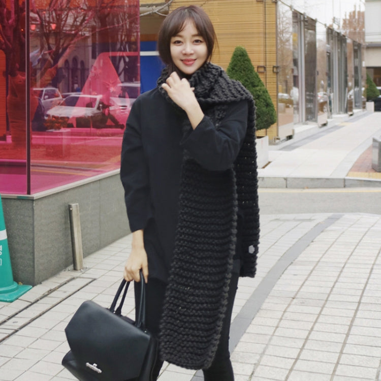 Thick knitted wool scarf, solid dark navy-black, long wrap with chunky rib texture