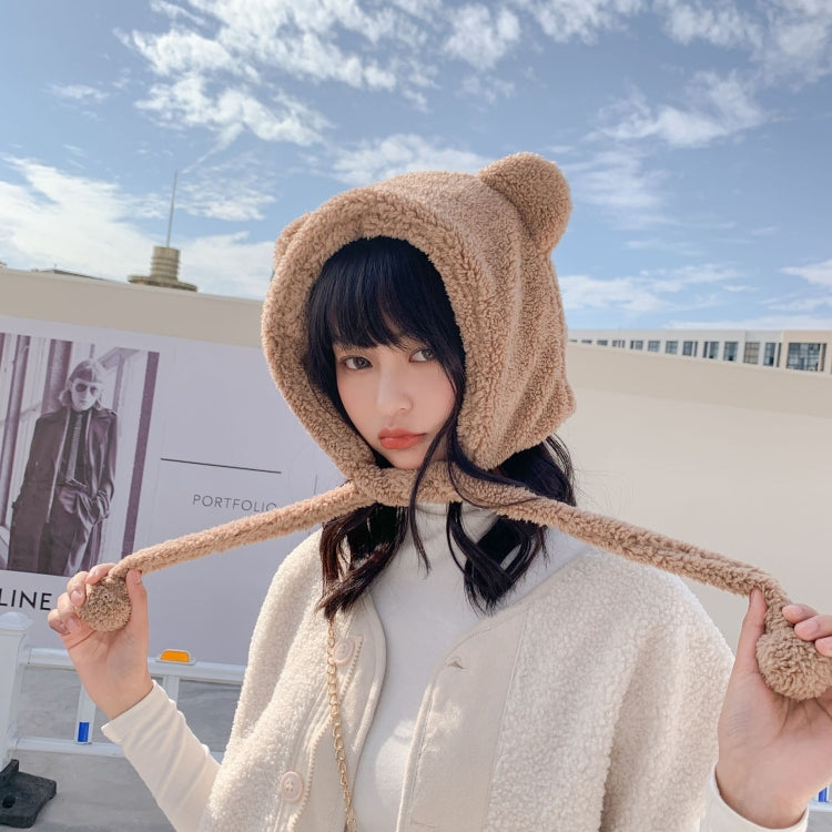 Beige plush bear-ear winter hat with long tether ties