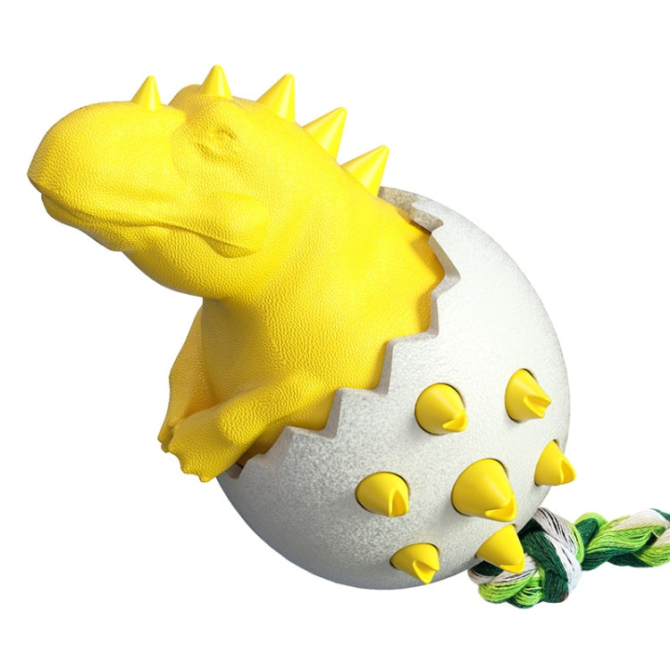 Yellow dinosaur egg dog molar stick chew toy with spiky shell and braided rope