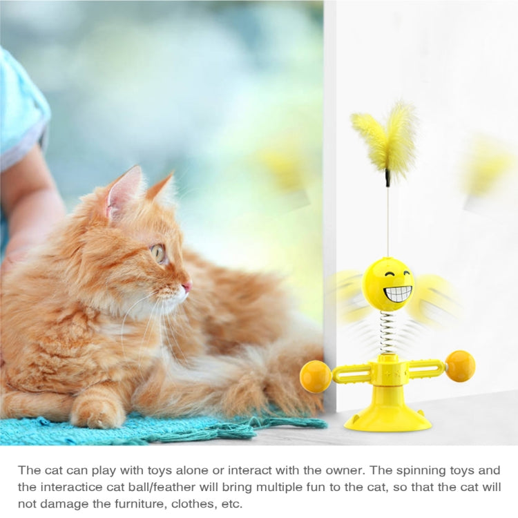 Interactive cat feather toy with smiling ball, yellow suction cup, and spring stalk