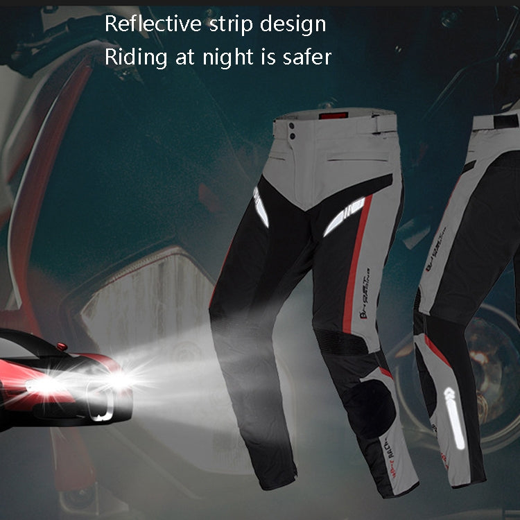 Light gray and black motorcycle riding trousers with reflective stripe design for night safety
