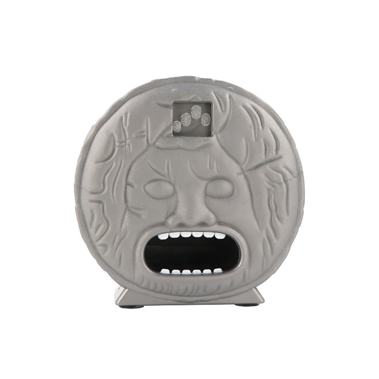 Gray brain-shaped electronic prank toy with open mouth and bite trigger on top.