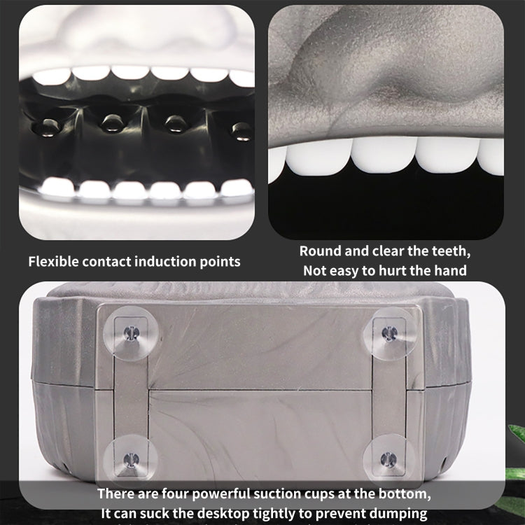 Gray brain-shaped bite toy with open white teeth; underside and contact point details.