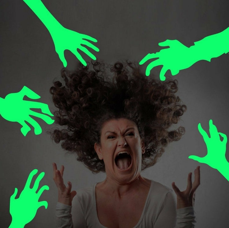 Luminous hand-and-arm silhouette wall stickers around a screaming face