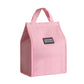 Insulated lunch box bag in pink, side panel visible, with carry handles