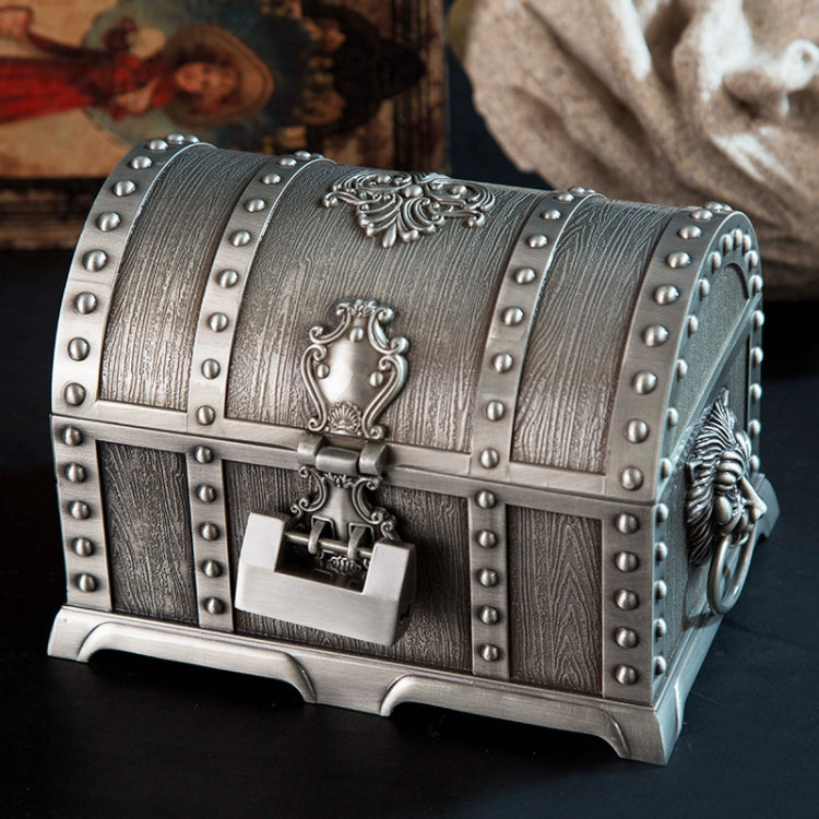 Silver-toned metal double-layer jewel box with studded trim and ornate lock