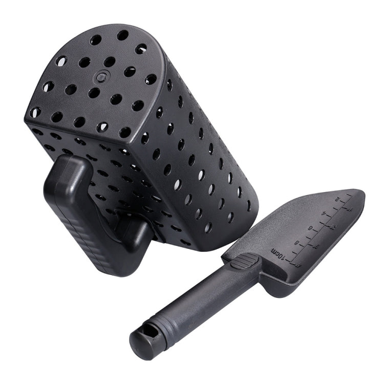 Angled black perforated sand scoop with measurement-marked shovel and long grip