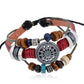 Beaded leather bracelet with circular silver charm, red and brown beads, silver tube accents