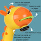 Yellow giraffe projector painting toy with orange lens and focus control knob