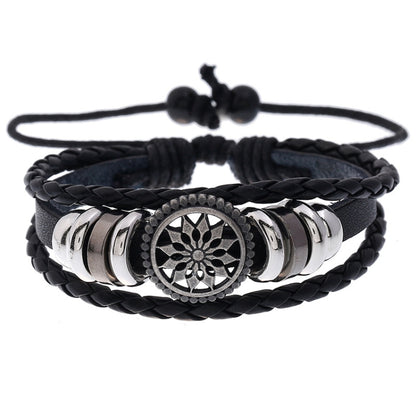 Black braided leather adjustable bracelet with round flower medallion and silver beads