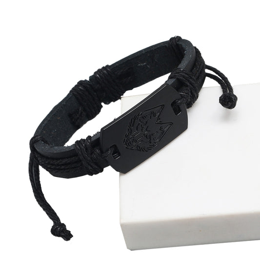 Black woven leather bracelet with rectangular wolf-head metal plate and cords