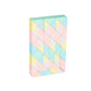 Light pastel magic ruler puzzle toy with interlocking blocks, tilted view