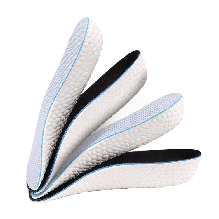 Set of half pad insoles with textured white base, black insert, and blue edge trim