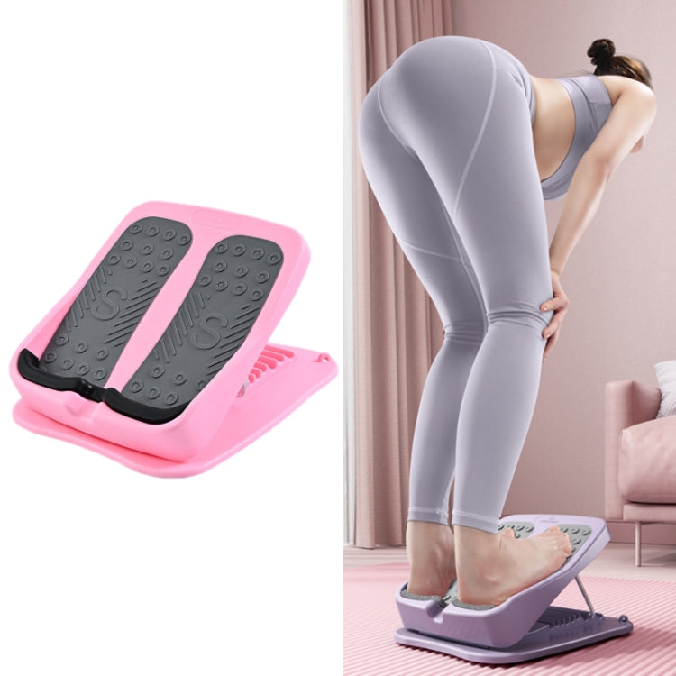Foldable tilt fitness pedal with black textured foot pads and pink base