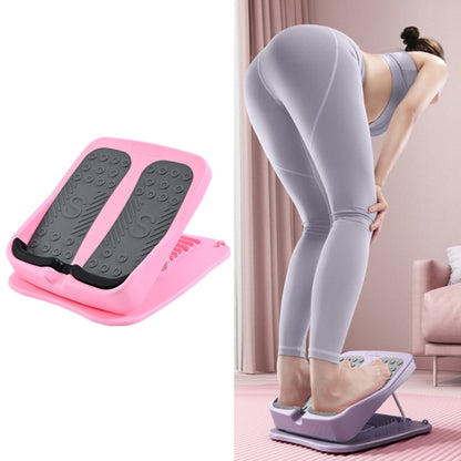 Foldable tilt fitness pedal with black textured foot pads and pink base