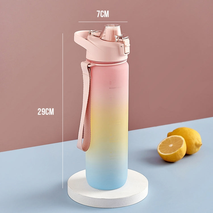 Gradient sports water bottle in cherry pink to sky blue with flip spout and carry strap