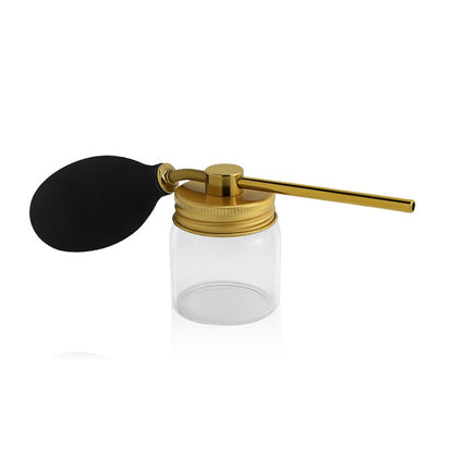 Hair fiber spray applicator bottle with gold pump and black silicone bulb nozzle