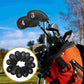 Golf bag with black numbered head covers on the club irons