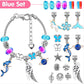 Blue charm bracelet with silver chain, blue beads, star and animal charms