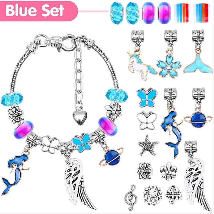 Blue charm bracelet with silver chain, blue beads, star and animal charms