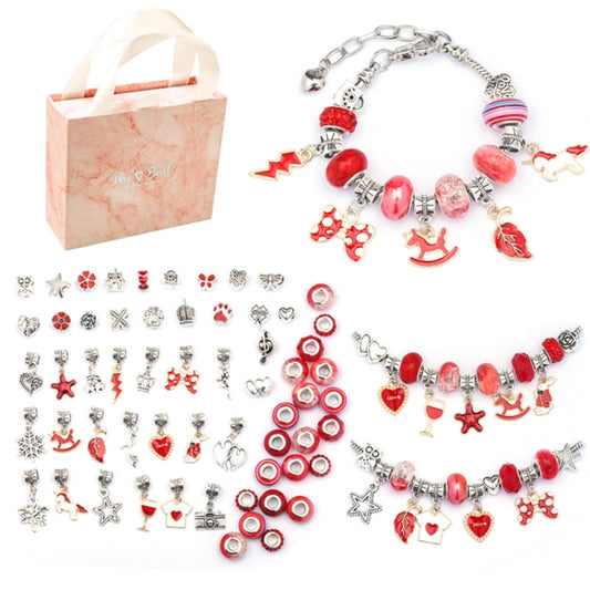 Children's DIY charm bracelet with red beads and mixed animal, heart, and star charms