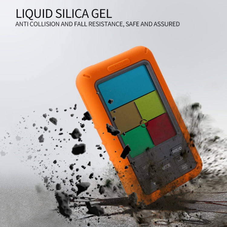 Orange wireless thermometer with color display and probe amid splatter