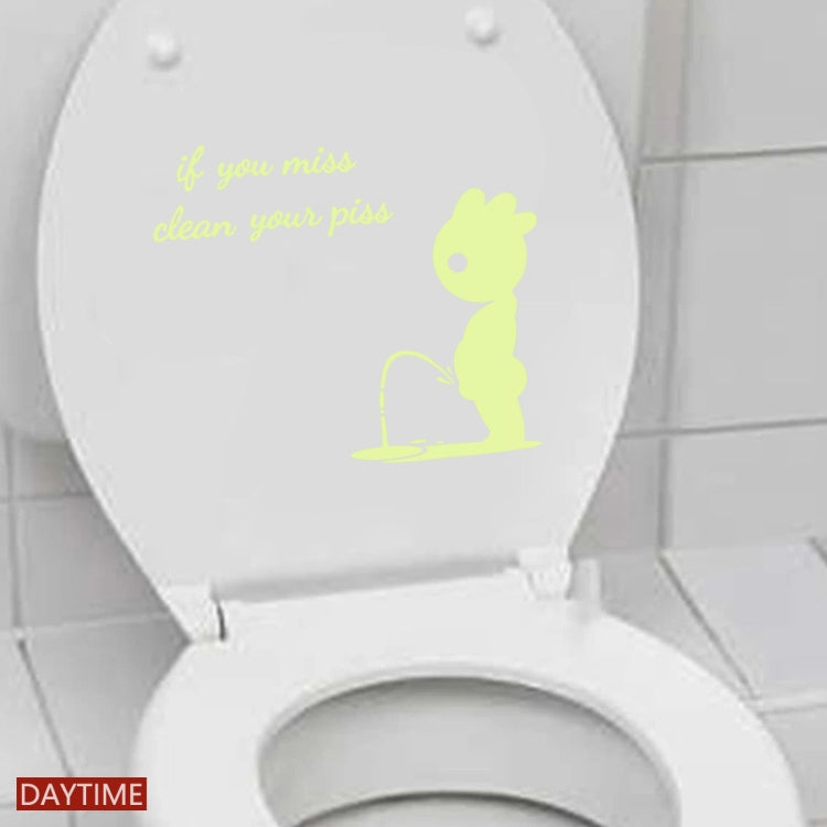 Luminous toilet lid sticker with yellow bunny silhouette and script quote