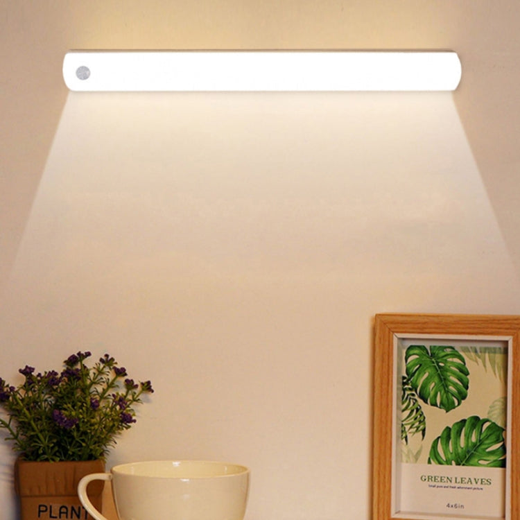 Rechargeable LED cabinet light bar with slim white body, unlit under cabinet