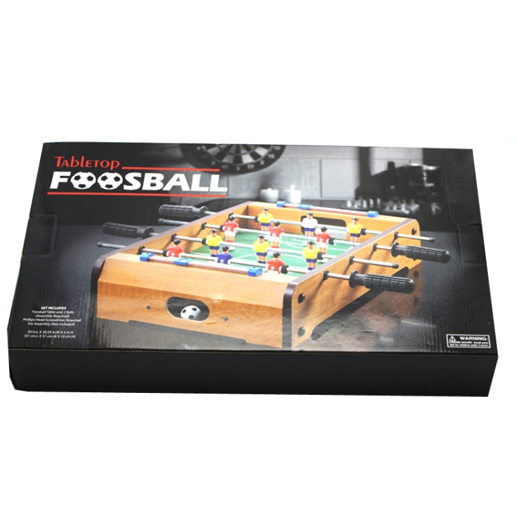 Tabletop foosball toy box showing mini wooden table with player figures