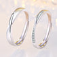 Mobius twist open adjustable ring set, one plain and one pavé stone band
