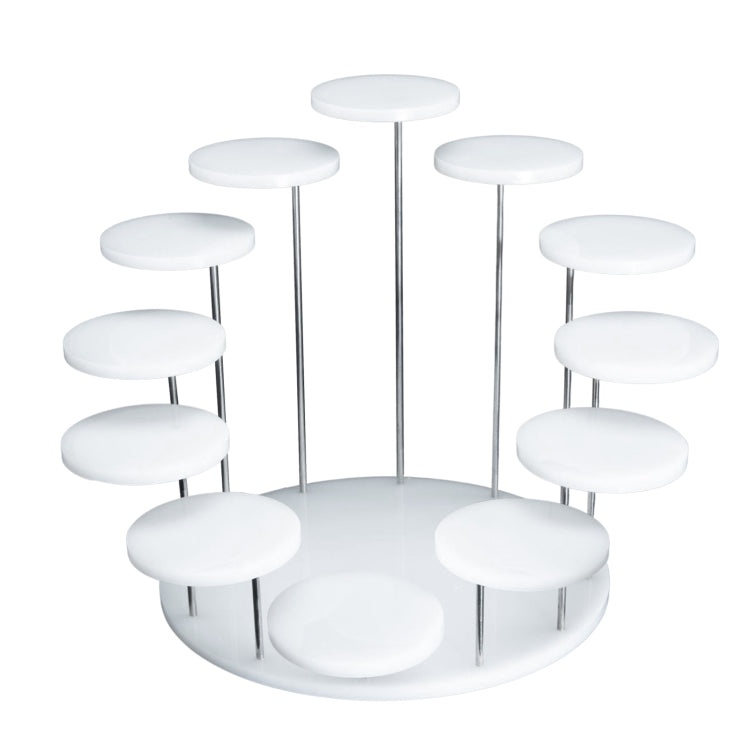 White acrylic ring display stand with round white pegs on metallic vertical rods