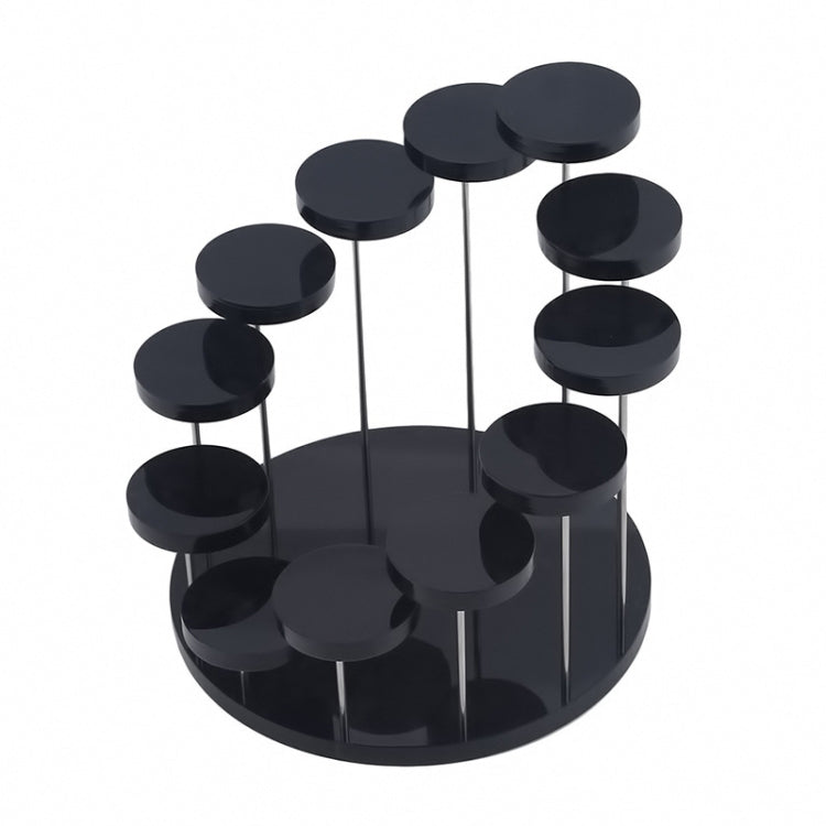 Black acrylic ring display stand with stacked round pegs on clear rods