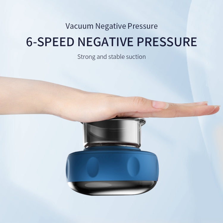 Blue electric cupping massage device head pressing onto skin with vacuum suction